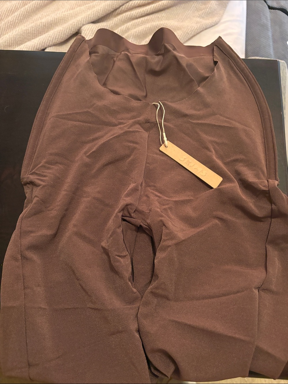 SKIMS Brown Shapewear leggings for dresses.